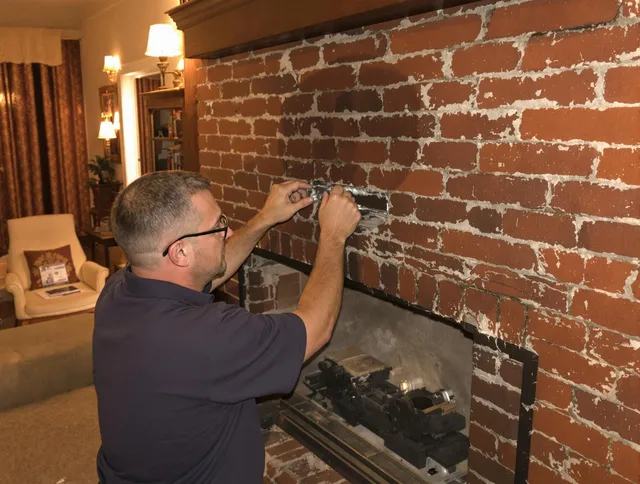 Anaheim Chimney Sweep expert fixing a fireplace in Anaheim, CA